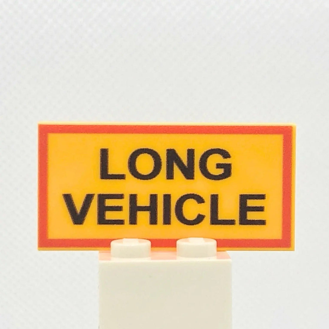 2x4 Tile „Long Vehicle“ – Bright Light Orange | UV-Druck | Brickhunter.shop
